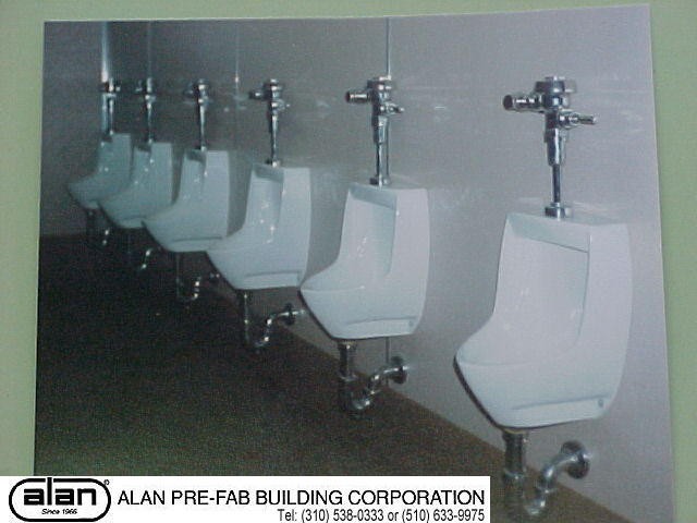 non ADA urinal bank in prefabricated building