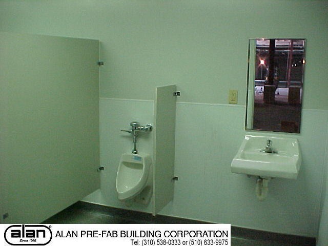 ADA comforming urinal in prefab building